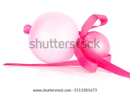 One whole pink latex pastel ballon with pink ribbon isolated on white background