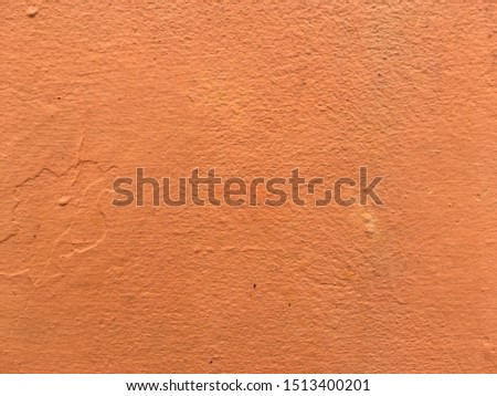 Orange cement wall backdrop for texture background