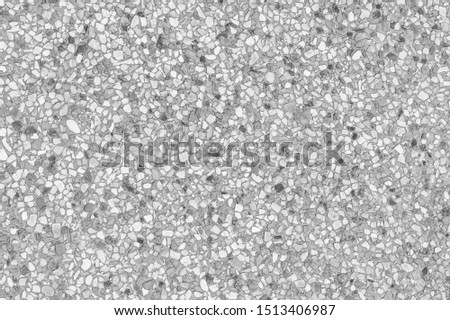 Black and White stone wall small pebbles texture on gray background