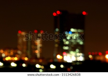 Abstract blur of transportation boat & building near the river on sunset