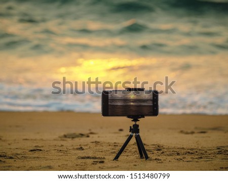 Set Mobile phone for a time lapse capture beach sunset