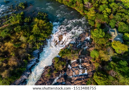 Aerial view of The Khone Falls and Pha Pheng Falls, waterfalls the " Niagara of the Asia", Champasak Southern Laos. Royalty high-quality free stock photo image of a beautiful waterfall