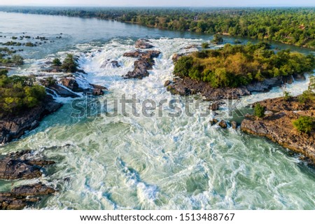 Aerial view of The Khone Falls and Pha Pheng Falls, waterfalls the " Niagara of the Asia", Champasak Southern Laos. Royalty high-quality free stock photo image of a beautiful waterfall