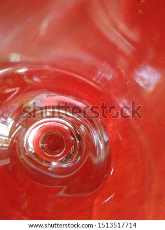 Top view closeup glass in red carpet