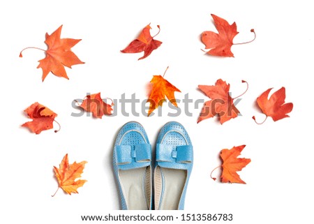 turquoise sandals ballet shoes and autumn orange dry leaves on a white background Top view Flat lay Hello autumn - september, october, november and sesonal sale concept Art