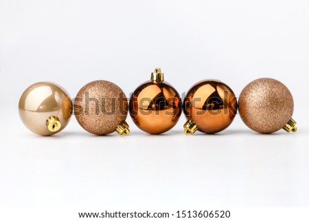 Five colored Christmas balls on white background. Christmas decor and toys. 