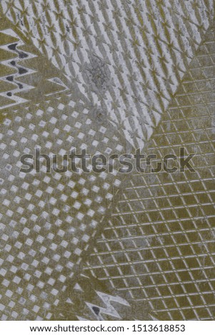 tiled seamless abstract mosaic pattern on metal surface