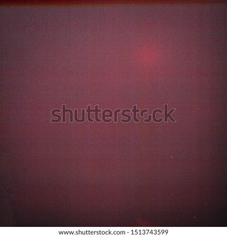 Designed film background with heavy grain and light leak