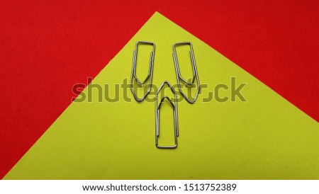 paper clip on color background with text space