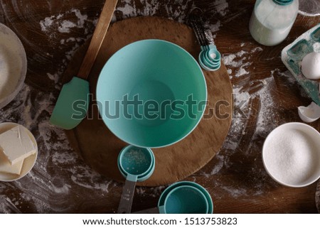 Confectioner's table, with mint-colored dishes, Indigents for dessert. Food photo