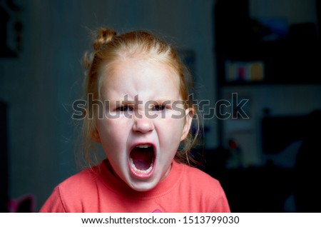 Angry screaming girl. Human emotions, crying and screaming. Royalty-Free Stock Photo #1513799030
