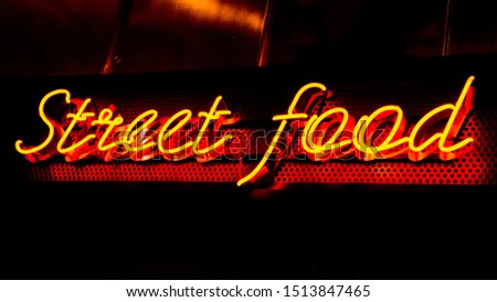 neon sign street food at a street cafe. banner 