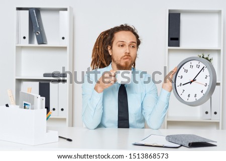 Business man working desk hours waiting in a coffee break
