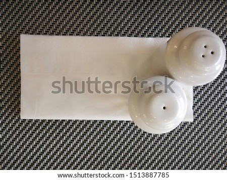 Salt and Pepper white tissue paper hotel table bottle