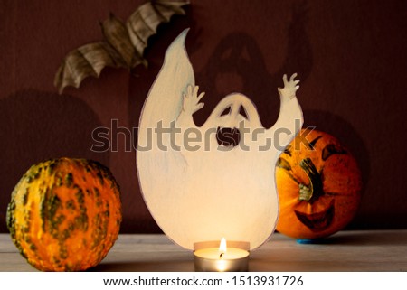 halloween and candles on a dark background