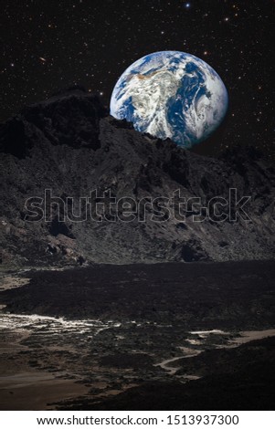 mountains on the moon overlooking planet earth. This image elements furnished by NASA	