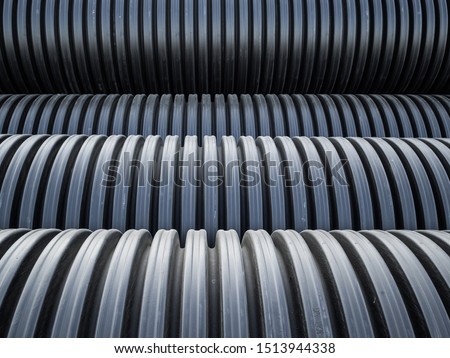 Corrugated double-walled pipes. Pipes for use in outdoor Sewerage systems. Big black pipes