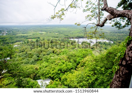  Landscape view on the beautiful forests, mountains and idyllic fields  with a blue sky clouds