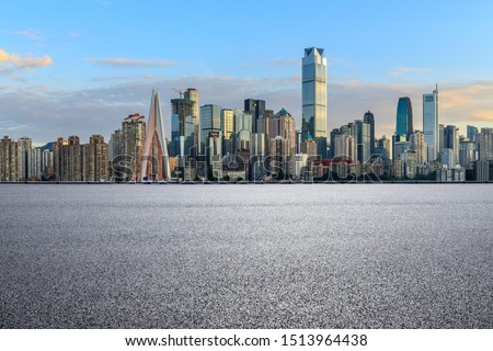 Asphalt highway passes through the city financial district in Chongqing at sunset,China.
