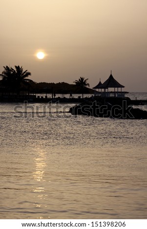 sunset over the sea at Runaway Bay, Jamaica, Royalty-Free Stock Photo #151398206