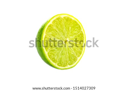 Lime light. Fresh juicy green lemon isolated on white background