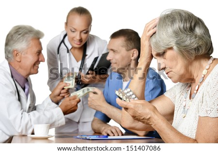 Patients giving money to a doctor