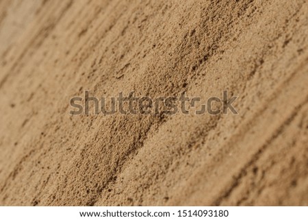 Texture of sand with small pebbles
