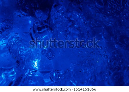 blue liquid with bubbles, macro