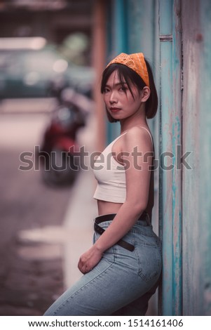 Portrait of asian hipsters girl pose for take a picture,Lifestyle of teen thailand people