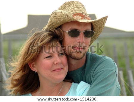 Man holding Woman