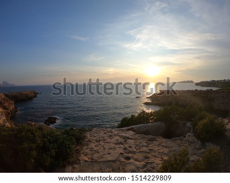 Sunset in Ibiza, Calla Llonga with sea and beautiful view