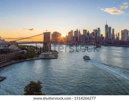 New York City sunset skyline Brooklyn Bridge