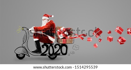 Santa Claus on scooter delivering Christmas or New Year 2020 gifts at snowy gray background