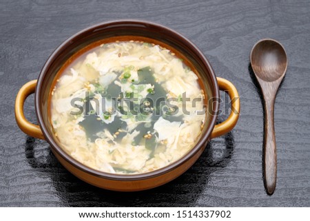 Japanese foof, Tamago egg soup in a bowl on table