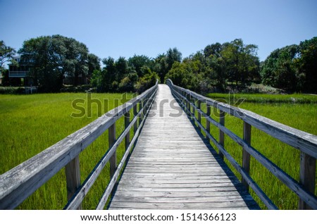 Wooden walking path over marsh at Oak Island North Carolina