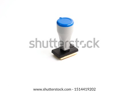 Close up blue rubber stamp isolated on white background with copy space.