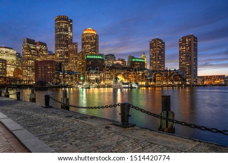 Scene of Boston skyline from Fan Pier at the fantastic twilight time with smooth water river, Massachusetts, USA downtown skyline, Architecture and building with tourist concept Royalty-Free Stock Photo #1514420774