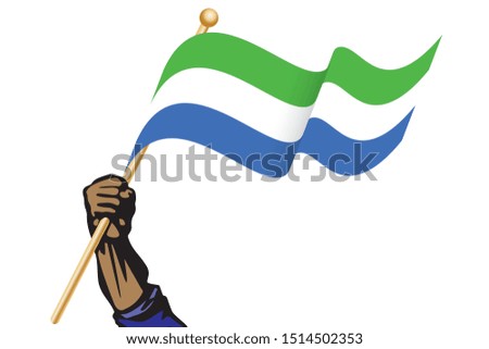 The hand holding the Sierra Leone flag.