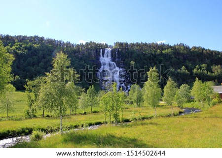 The waterfall in mountains of Norway