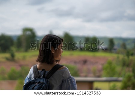 young cute Japanese Asian hipster girl travelling at beautiful sky 
mountains scenery park hiking garden views at Kanchanaburi Thailand guiding 
idea for female backpacker woman women backpacking