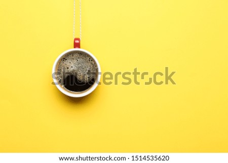 Creative Christmas composition with cup and string on color background
