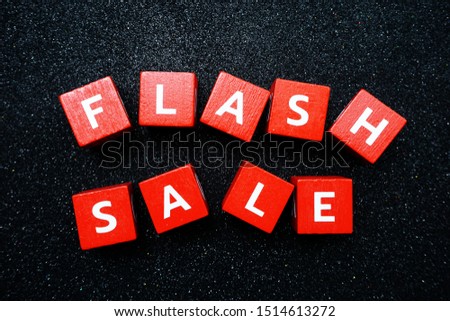 Flash Sale alphabet letter on black glitter background