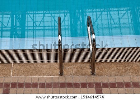 Stainless steel handrails Beside the Swimming pool.