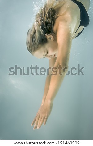 An image of a beautiful diving woman
