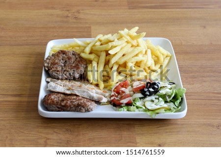 meat and vegetable sandwich white fries
