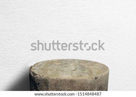 Piece, section, chump cement floor for advertising products with white cement or concrete wall texture background, Empty space.