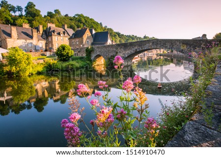 Dinan Old Medieval Bridge and Stone Houses Reflecting in Rance River in Bretagne, Cotes d'Armor, France Royalty-Free Stock Photo #1514910470