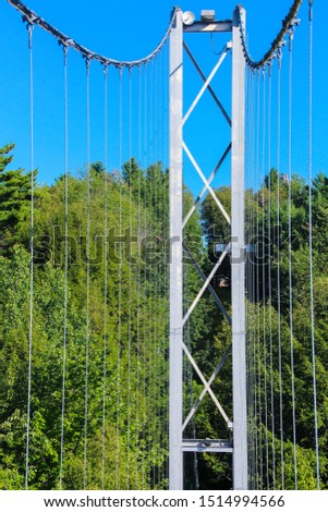 Pier and cable of suspension bridge, Gorge park, Coaticook, Quebec