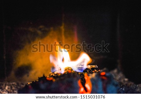 Orange flame on hot coals