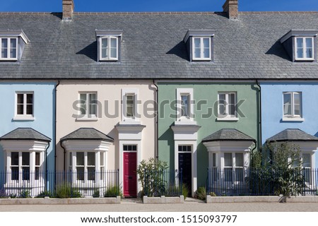 Row of colorful english houses Royalty-Free Stock Photo #1515093797